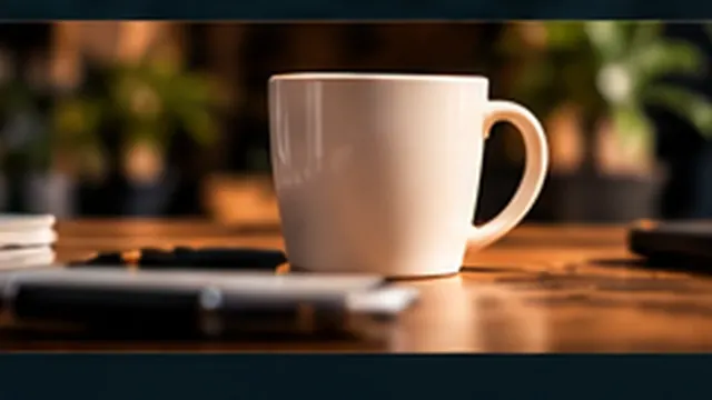 Mug on a desk reading It's fine